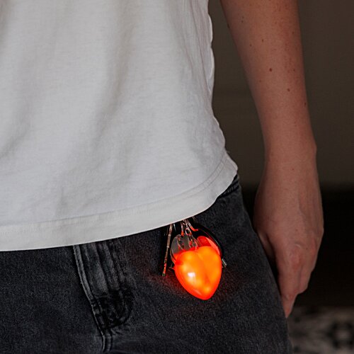 Additional Image 7 - a person wearing a white shirt and a white shirt with a red light in his pocket