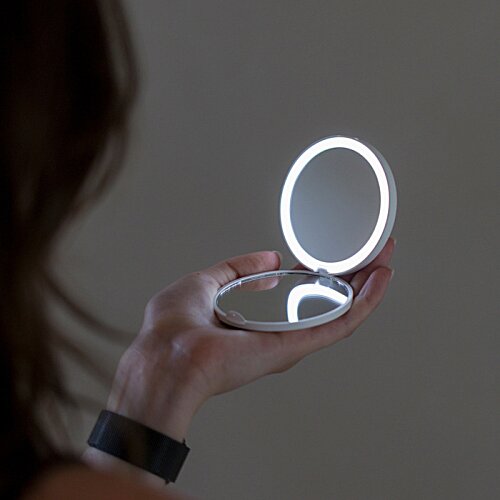 Additional Image 8 - a hand holding a glowing circle