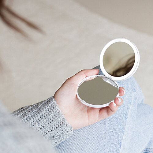 Additional Image 9 - a hand holding a small round object