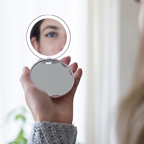 Additional Image 10 - a hand holding a small mirror
