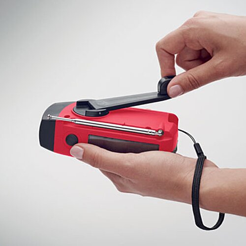 Additional Image 5 - a person holding a red and black device