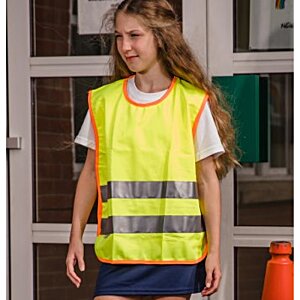 Additional Image 1 - a woman wearing a yellow vest