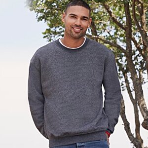 Additional Image 1 - a man standing outside with his hands in his pockets