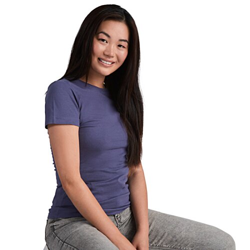 Additional Image 2 - a woman sitting on a white surface