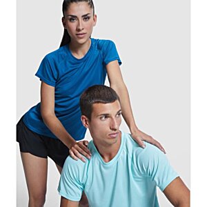 Additional Image 5 - a woman standing behind a man