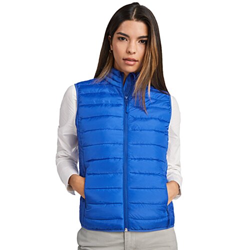 Additional Image 3 - a woman wearing a blue vest