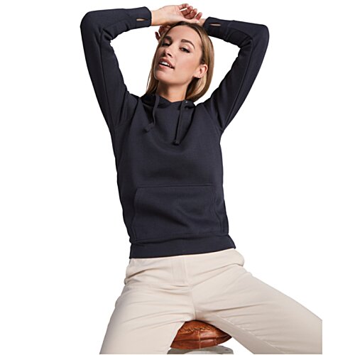 Additional Image 3 - a woman sitting on a stool