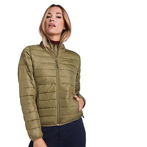 Additional Image 1 - a woman in a green jacket