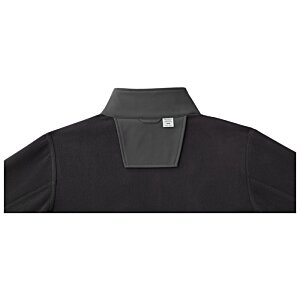 Additional Image 2 - a black jacket with a square patch