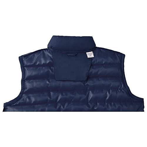 Additional Image 2 - a blue vest with a white button
