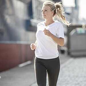 Additional Image 1 - a woman running on a sidewalk