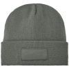 a grey beanie with a label