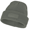 a grey beanie with a label