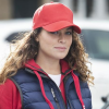 a woman wearing a red hat