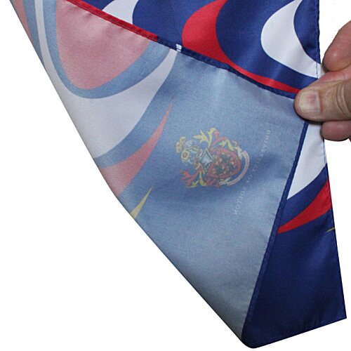 Additional Image 1 - a hand holding a blue and white handkerchief