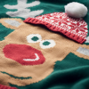 a knitted sweater with a reindeer face