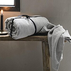 Additional Image 4 - a rolled up white towels on a wooden table