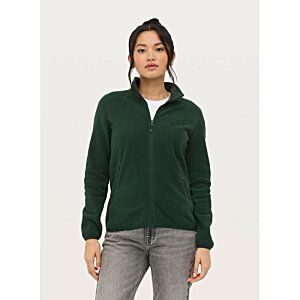 Additional Image 15 - a woman wearing a green jacket