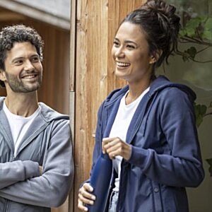 Additional Image 6 - a woman smiling and holding a microphone