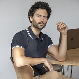 Additional Image 5 - a man sitting at a table