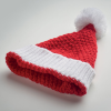 a red and white knitted hat