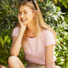 a woman sitting on a bench