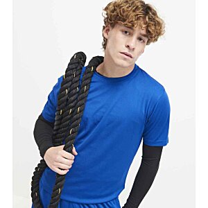 Additional Image 22 - a person in blue shirt holding a black object