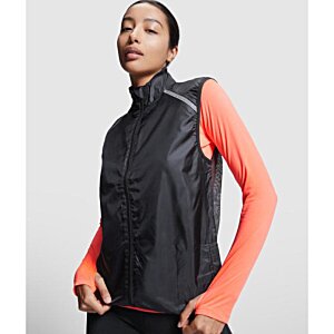 Additional Image 5 - a woman in a black and orange shirt