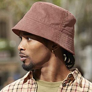 Additional Image 2 - a man wearing a hat