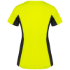 a yellow and black shirt