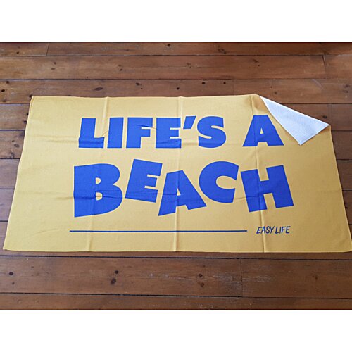 Additional Image 1 - a yellow sign with blue writing on it