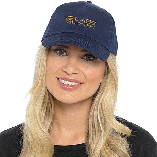 Additional Image 1 - a woman wearing a blue hat