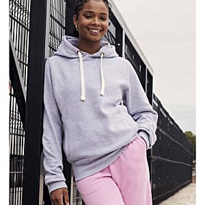 Additional Image 4 - a woman leaning against a black railing