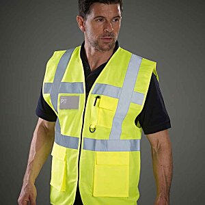 Additional Image 1 - a man wearing a yellow vest