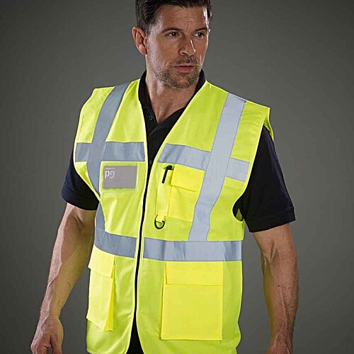 Additional Image 1 - a man wearing a yellow vest