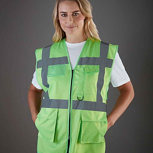 Additional Image 3 - a woman in a green vest
