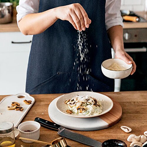 Additional Image 2 - a person pouring food into a bowl