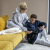 Additional Thumbnail Image 4 - a man sitting on the floor next to a woman