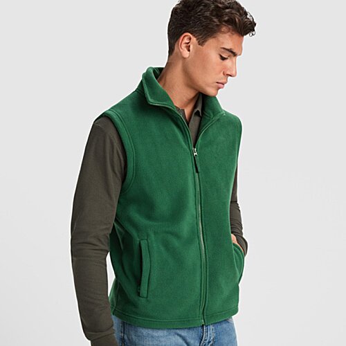 Additional Image 2 - a man in a green vest