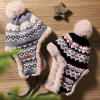 Additional Thumbnail Image 1 - a pair of hats on a wood surface