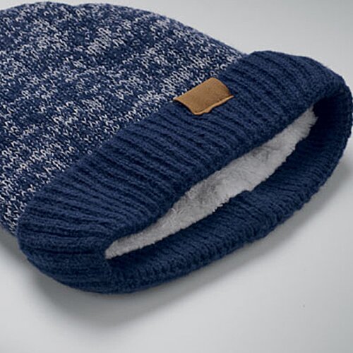 Additional Image 1 - a blue knit cap with a brown label