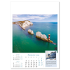 a calendar with a picture of a body of water