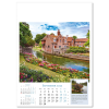 a calendar with a picture of a house and a pond