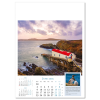 a calendar with a picture of a train on the water