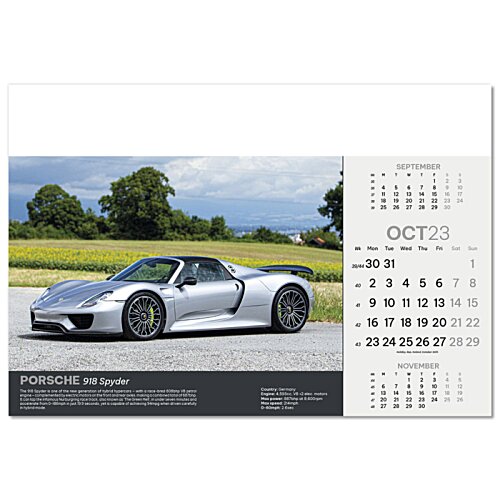Additional Image 9 - a silver sports car on a road