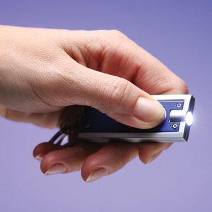 Additional Image 3 - a hand holding a small object