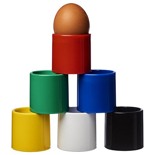 Additional Image 1 - a brown egg on top of several colored cylinders