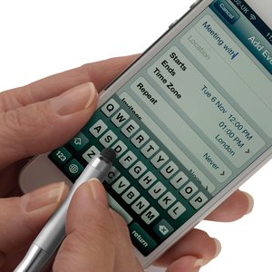 Additional Image 1 - a person using a cell phone