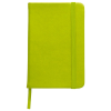 a green notebook with a bookmark