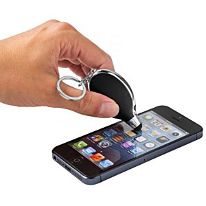 Additional Image 3 - a hand holding a keychain over a cell phone